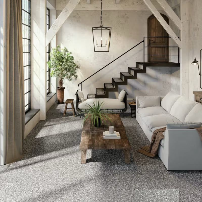 Living con piso de mosaico granítico gris